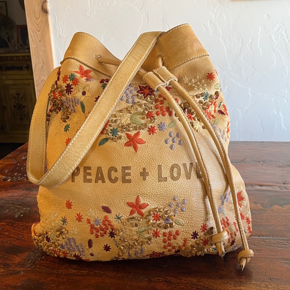 Latico Meadows Peace + Love Embroidered Tan Leather Bucket Bag
Boho PRICE FIRM
